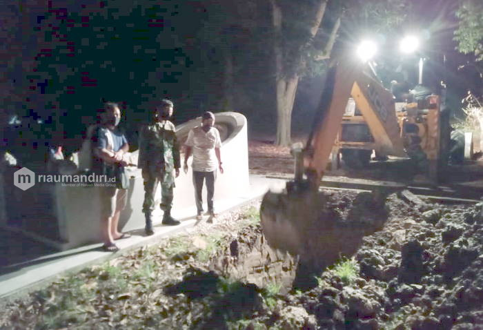 Diduga Terinfeksi Corona, Satu Warga Tionghoa di Siak Dimakamkan Sesuai Protap Covid-19