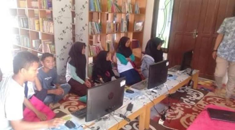 Perpusdes Kampung Mandi Angin Siak Menuju Pepustakaan Online