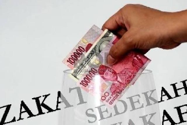 Muslimat NU Inhil Gelar Penyaluran Zakat, Infak dan Sedekah