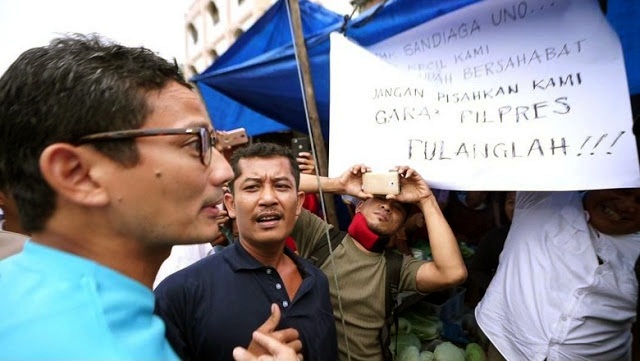 Sandi Temukan Tulisan Minta Dirinya Pulang, Pedagang: Kami Dibayar untuk Pasang Poster Itu