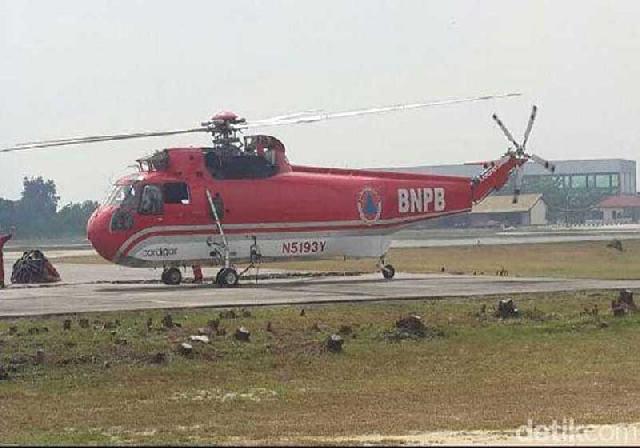 BPBD Riau Kirim Bantuan dengan Helikopter