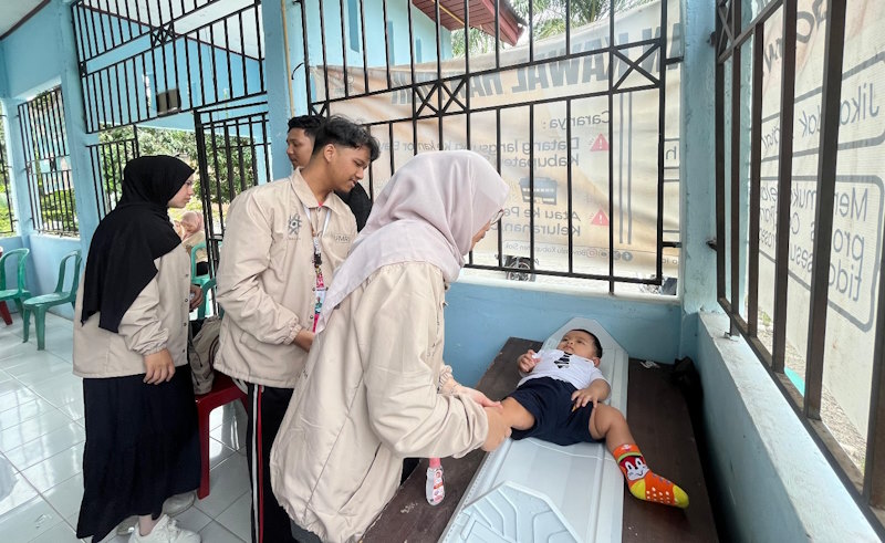 Mahasiswa KKN MAs Desa Langkai Gelar Program Massage Bayi dan Pencegahan Stunting 