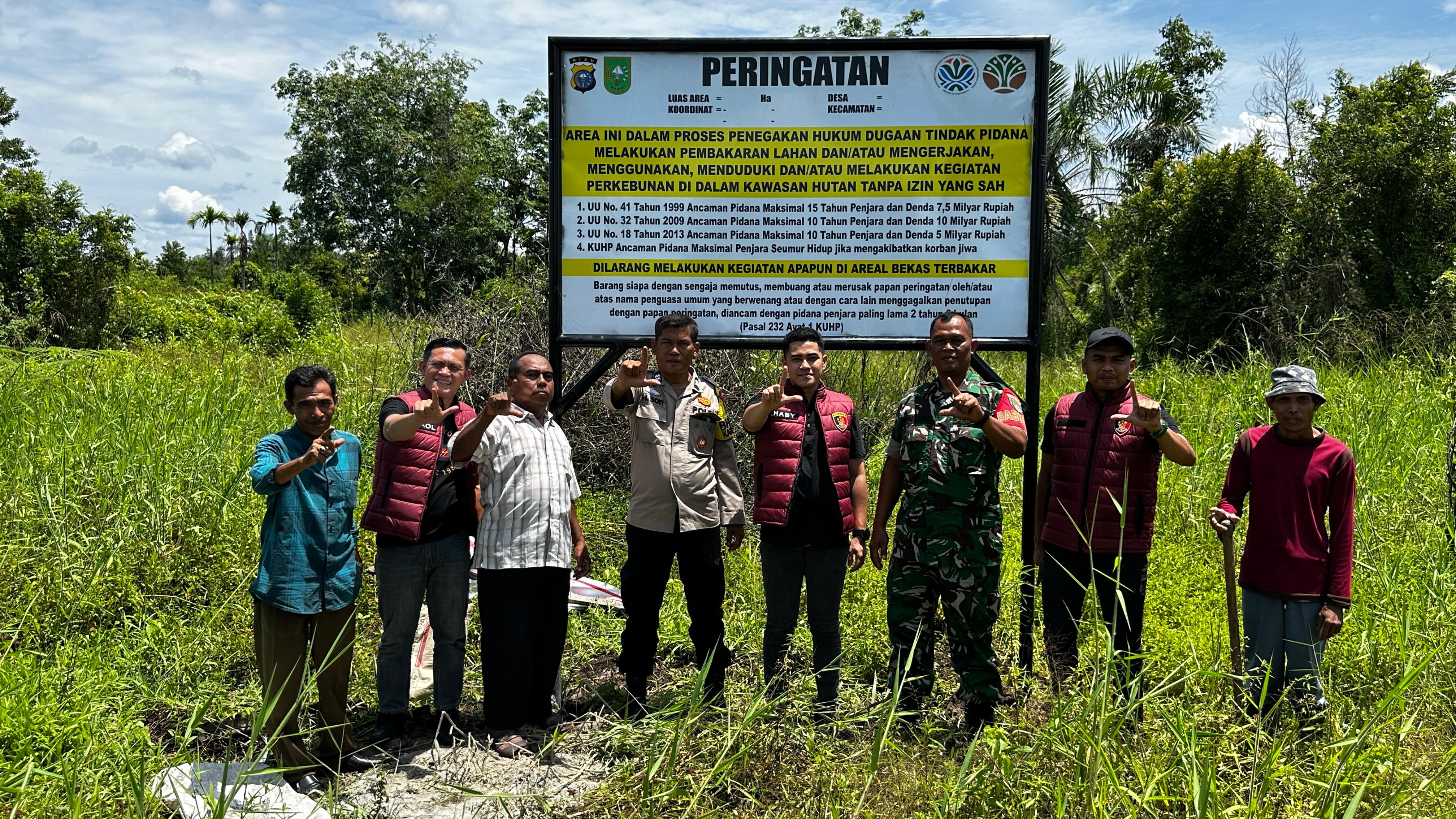 Polresta Pekanbaru Pasang Plang Peringatan di Kecamatan Rumbai: Jaga Agar tak Terbakar Lagi