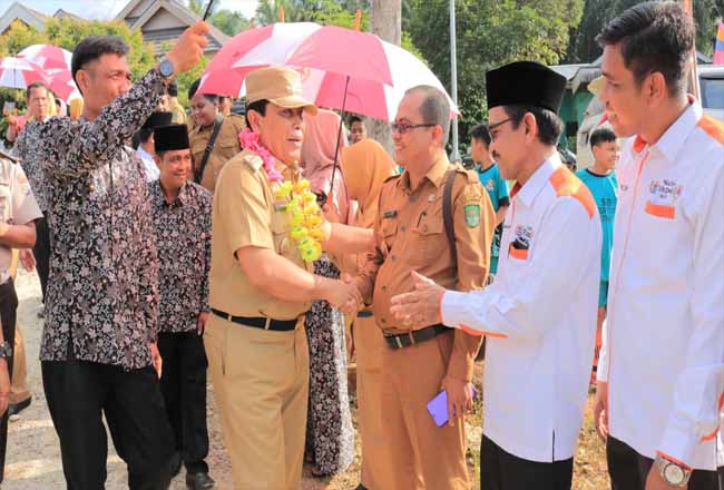 Hadiri MPTB Desa Tapung Jaya, Bupati Sukiman Disambut Meriah Masyarakat