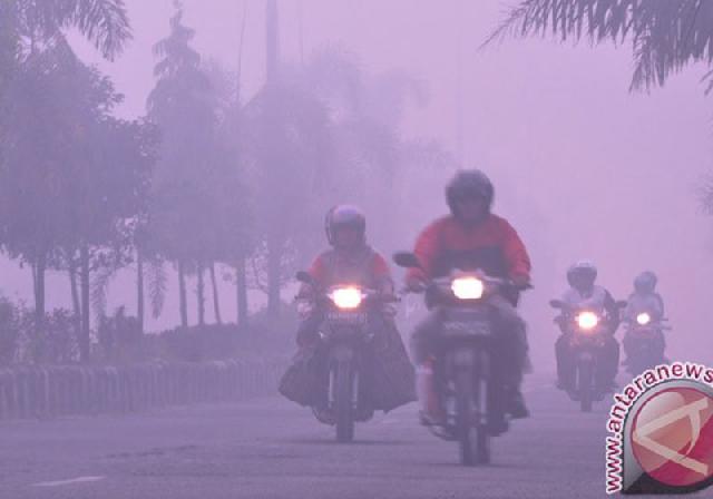 Kabut Asap Selimuti Perairan Laut Rohil