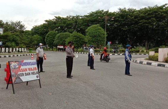 Gencar Sosialisasi di Siak, Satgas Covid-19 Imbau Pengendara Wajib Pakai Masker dan Helm