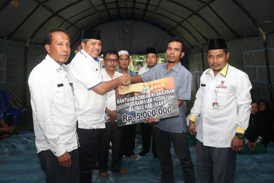 Baznas Siak Salurkan Bantuan kepada Korban Kebakaran di Pinang Sebatang, Tualang