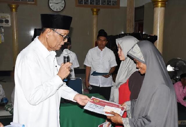 Tim Safari Ramadan Pemkab Kampar Serahkan Berbagai Bantuan kepada  Masyarakat