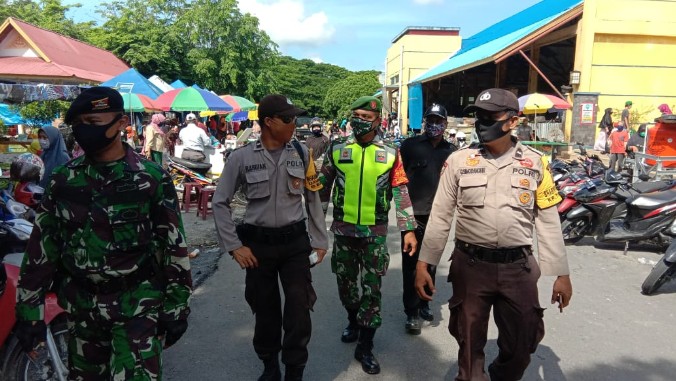 Pelanggaran Protokol Kesehatan Sering Terjadi di Pasar, Petugas Gabungan Siak Sampaikan Imbauan