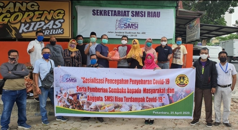 Gandeng BSP, SMSI Riau Sosialisasi Pencegahan Covid-19 dan Bagi Sembako kepada Masyarakat