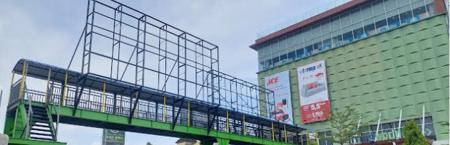 Reklame Modus JPO Berdiri Kokoh di Simpang LW