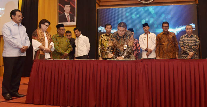 Di Hadapan KPK, Bank Riau Kepri Teken MoU Pajak Online dengan 4 Walikota dan 2 Bupati