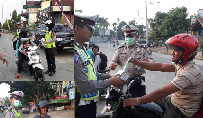 Peduli Masyarakat, Puluhan Anggota Satlantas Polres Kuansing Bagikan Masker