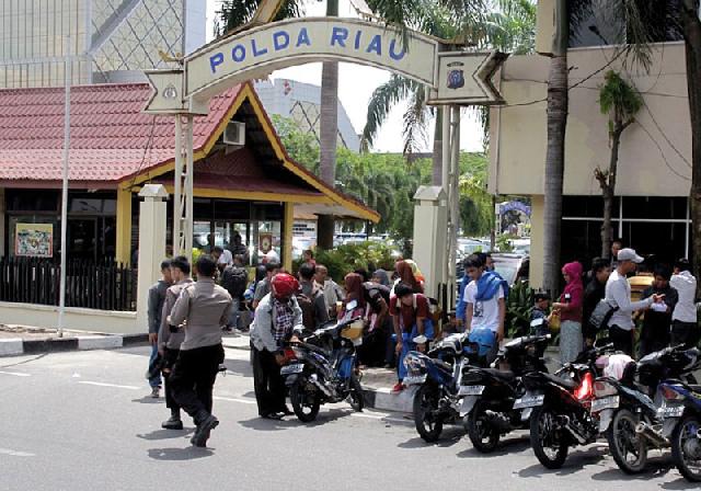 Oknum Polisi Dilaporkan ke Polda Riau
