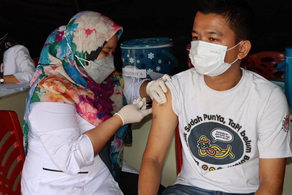 Ajak Warga Vaksin, Polres Pelalawan Sediakan Lapak Vaksinasi di Pangker Riau