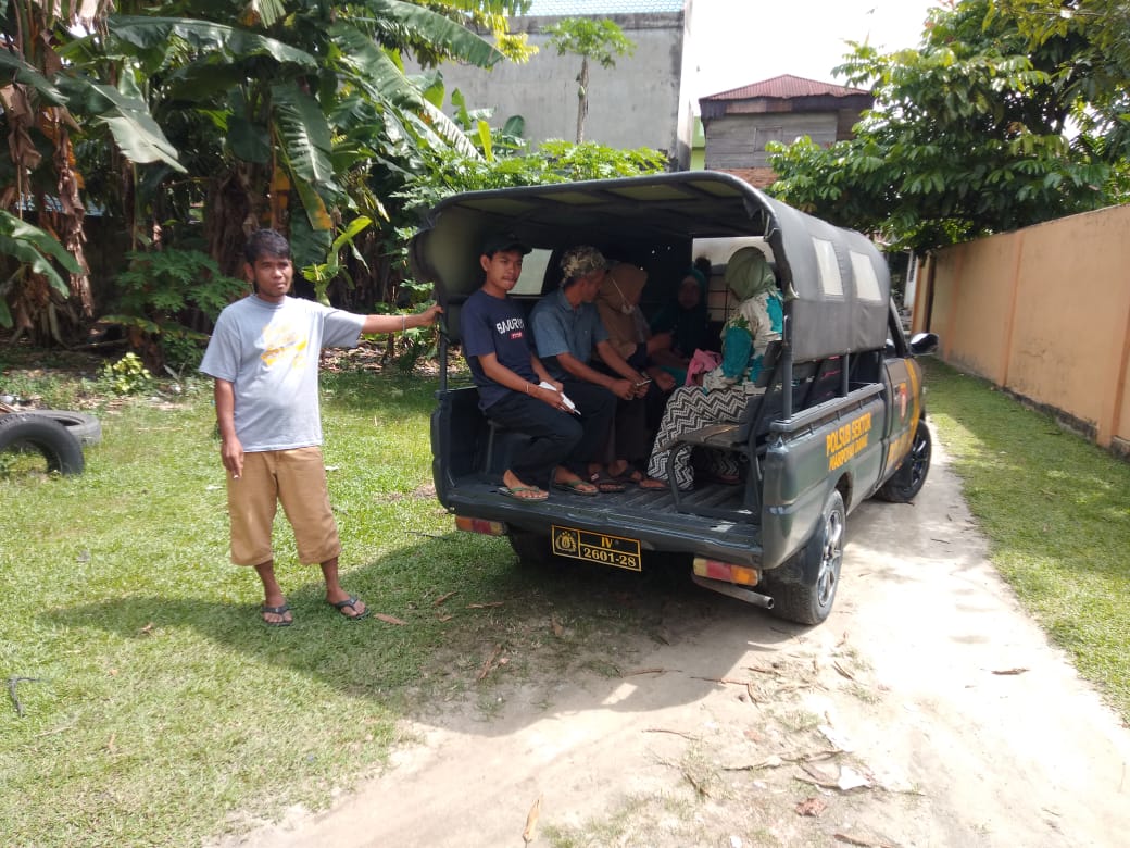 Vaksinasi Massal, Polsek Bukit Raya Langsung Jemput Warga ke Rumah