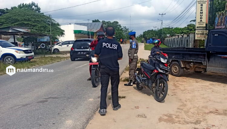 Kesadaran Pakai Masker Warga Pelalawan Makin Tinggi