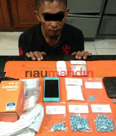 Polisi Bekuk TKI Penyelundup Narkoba dari Malaysia
