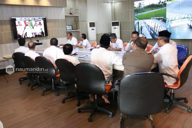 Teleconference dengan Gubri, Pemkab Siak Sampaikan Sejumlah Hal Terkait Pecegahan Corona