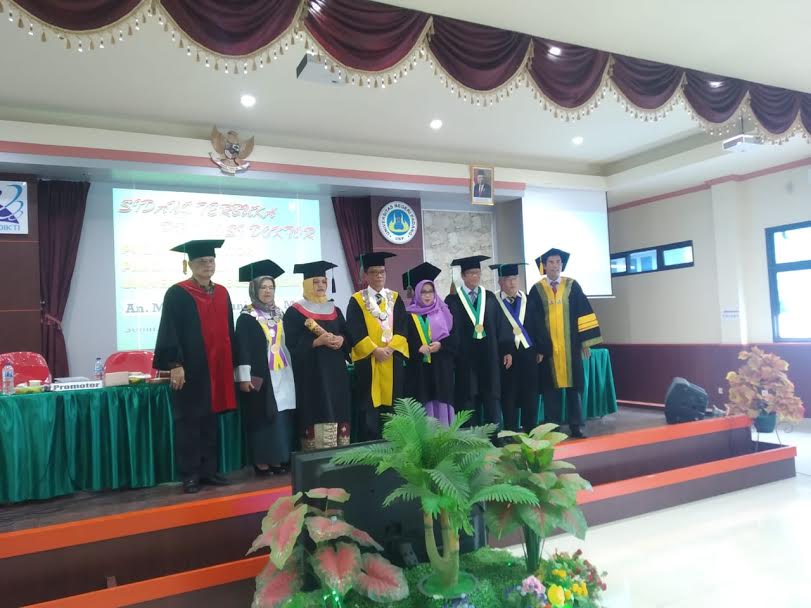 Sekretaris PWI Kampar Raih Gelar Doktor dengan Predikat Cumlaude
