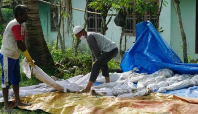 Kuburan Massal Korban Tsunami Aceh Dipindahkan